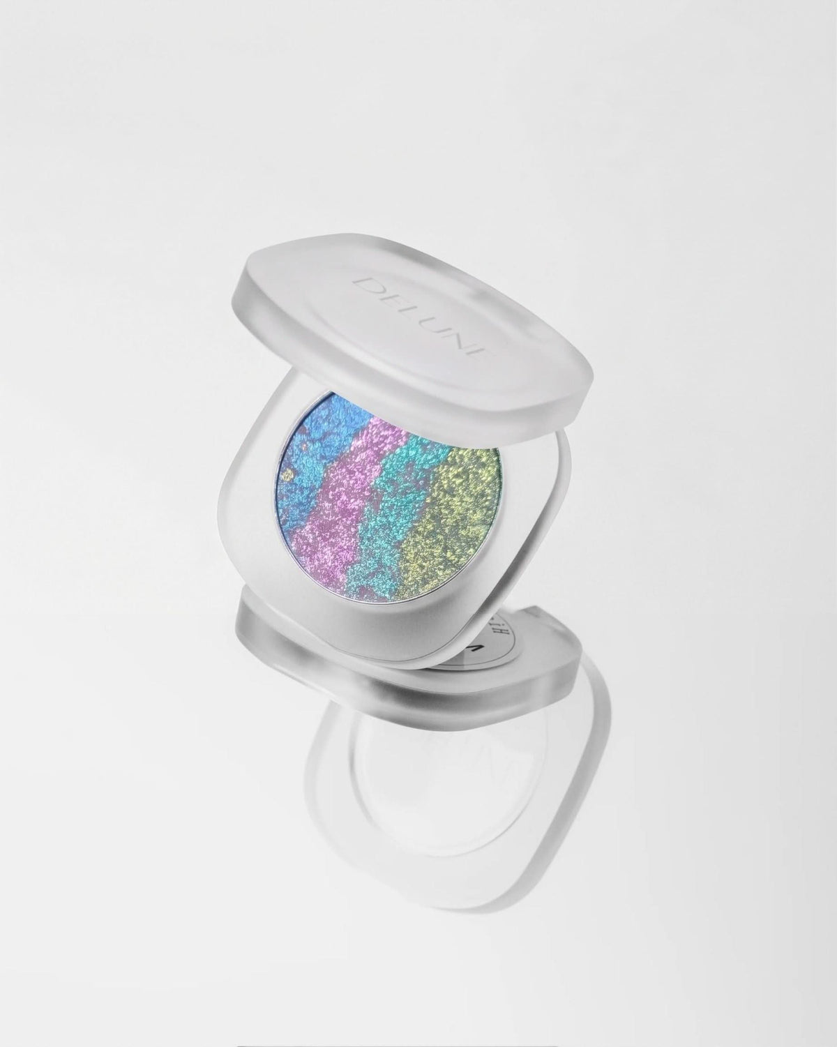 Highlighter UAE – Delune Dubai Pressed Powder Highlighter open compact in rainbow shimmer
