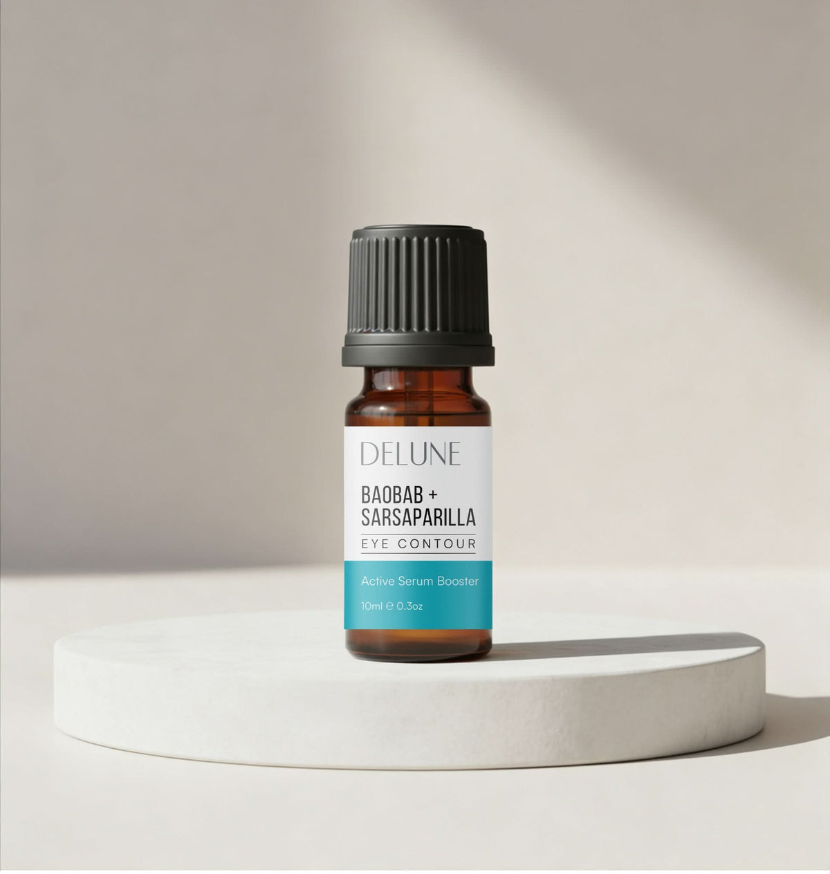 Face serum booster for eye contour UAE – Delune Dubai Baobab + Sarsaparilla Active Serum Booster 10ml on a white podium