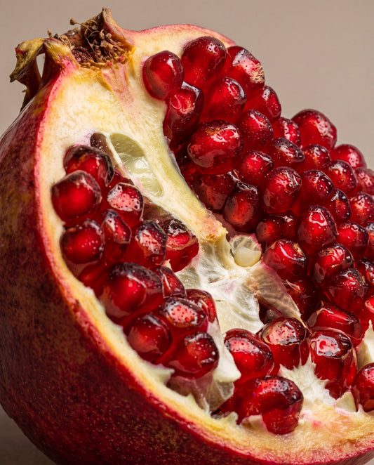 Reed diffuser UAE – Delune Dubai Dark Pomegranate scent notes: a pomegranate broken open with ruby seeds