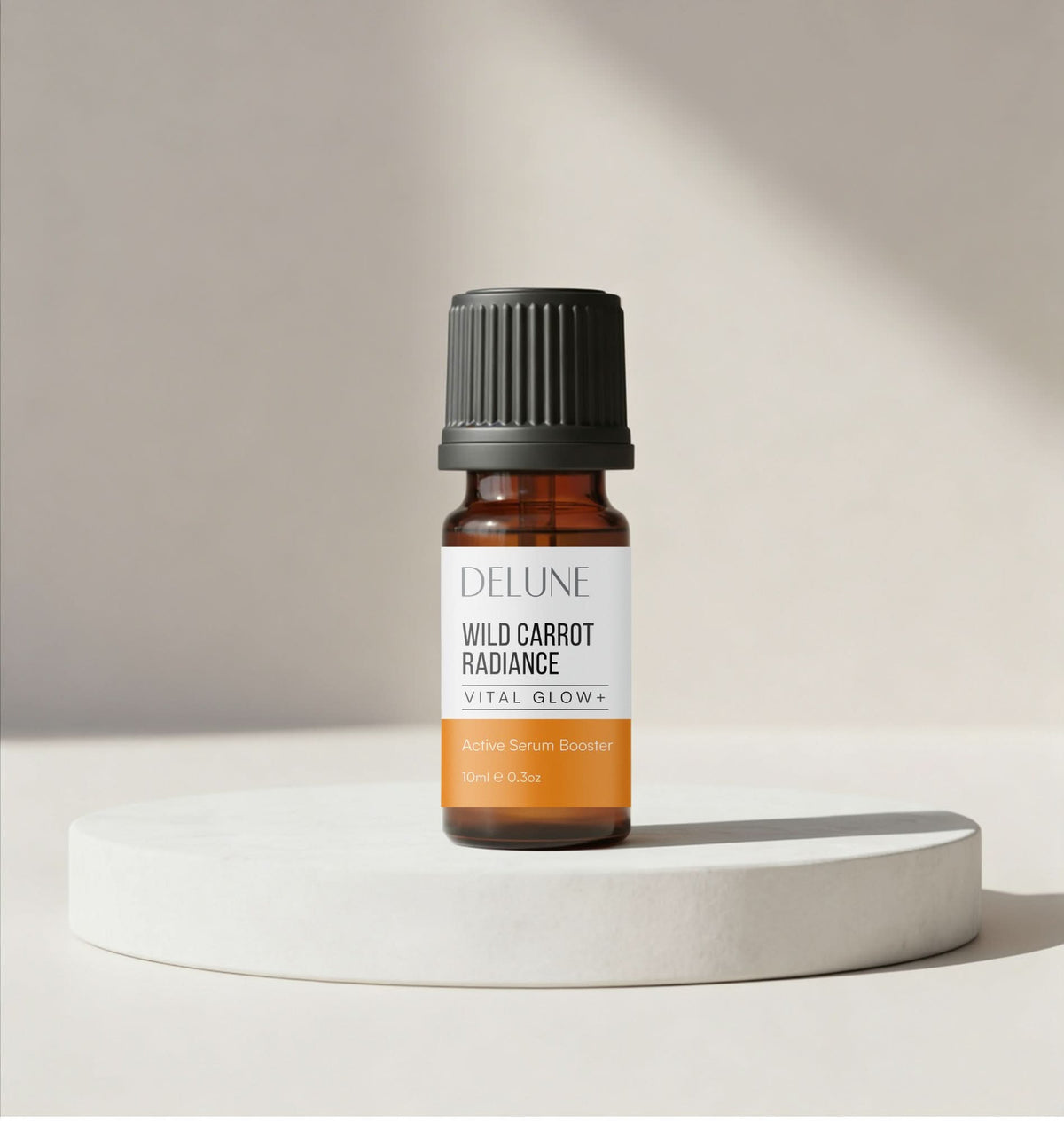 Face serum booster for vital glow UAE – Delune Dubai Wild Carrot Active Serum Booster 10ml on a white podium