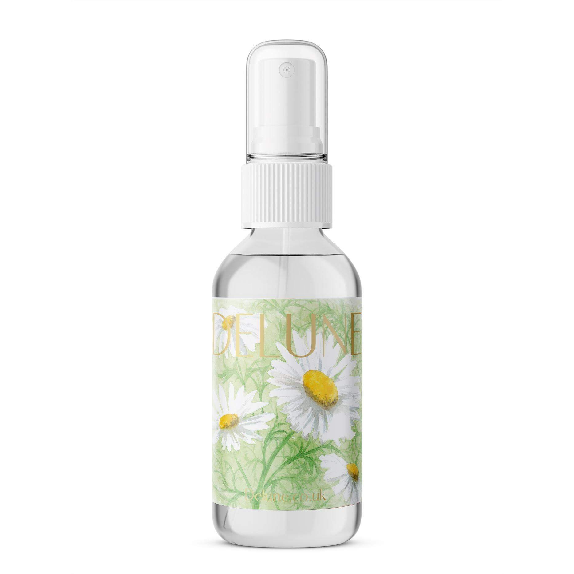 Chamomile Hydrosol Face Mist bottle with floral design, offering soothing, calming skincare with natural chamomile extract.