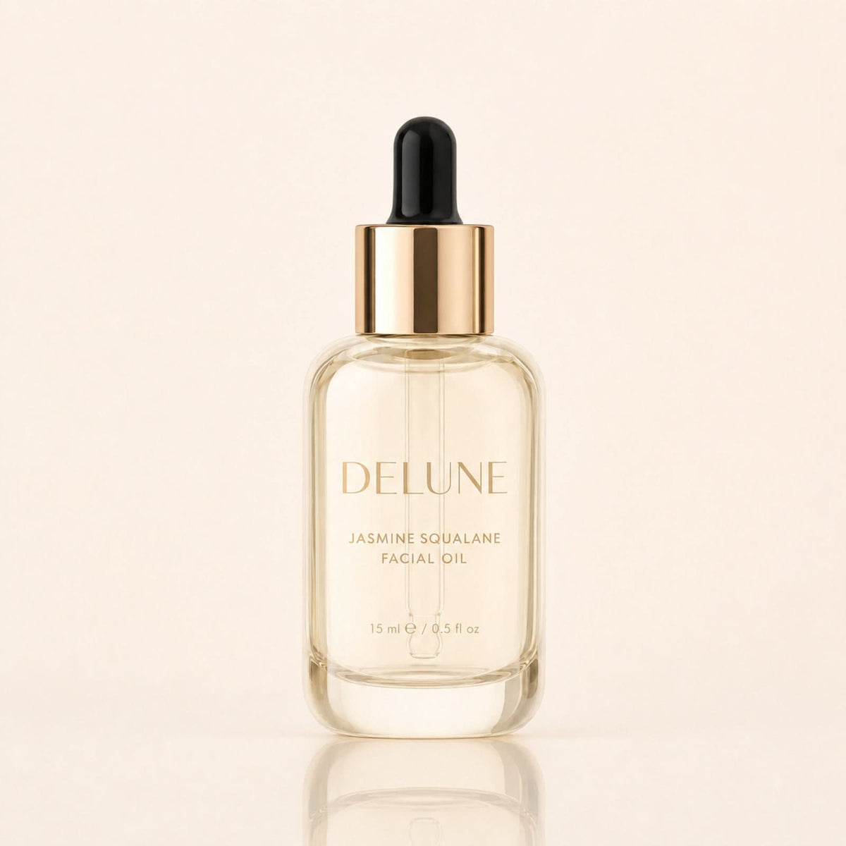 Face oil UAE – Delune Dubai Jasmine Squalane Facial Oil 15ml in pale champagne glass bottle