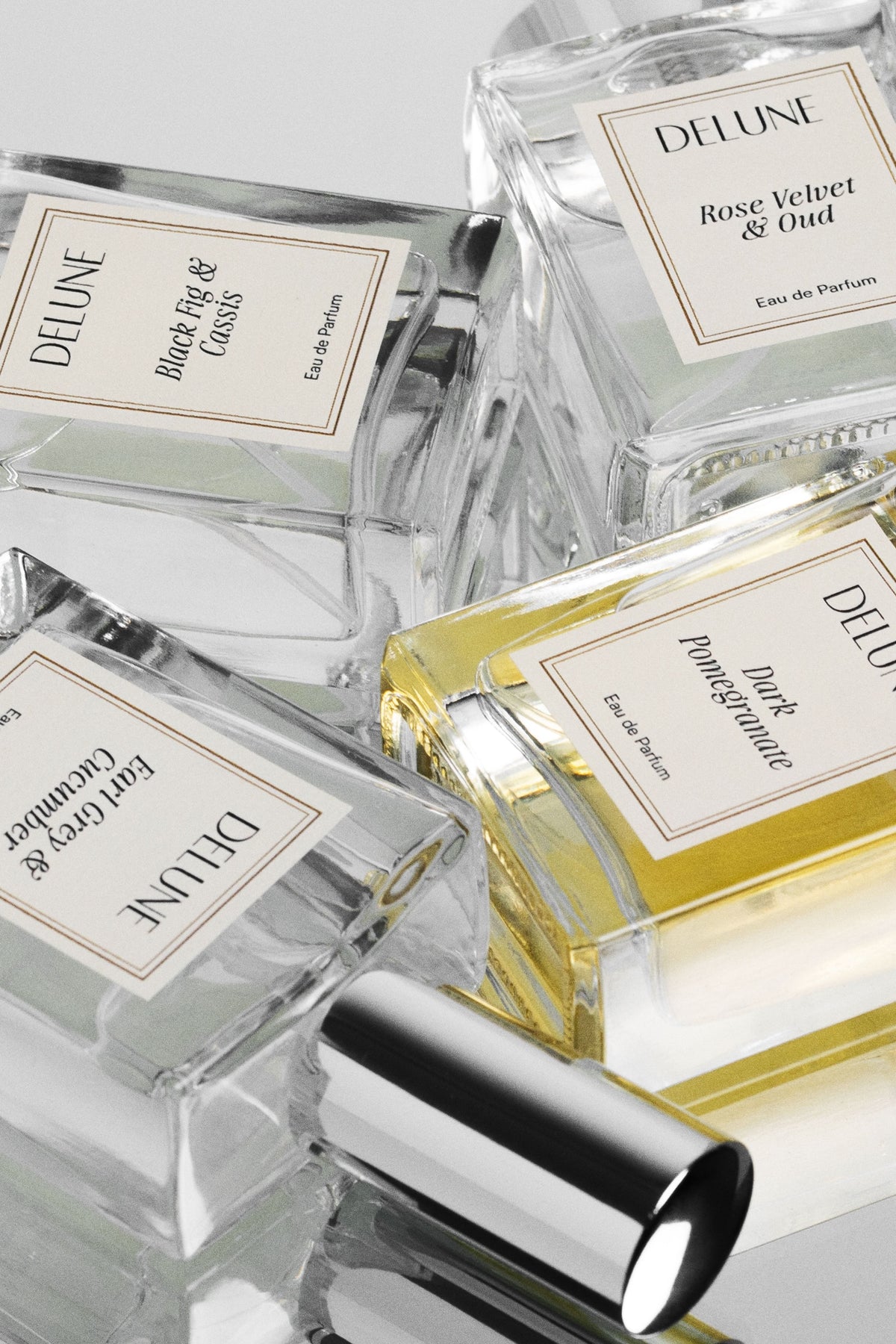 Perfume UAE – Delune Dubai Basil Lime & Mandarin Eau de Parfum bottles close-up