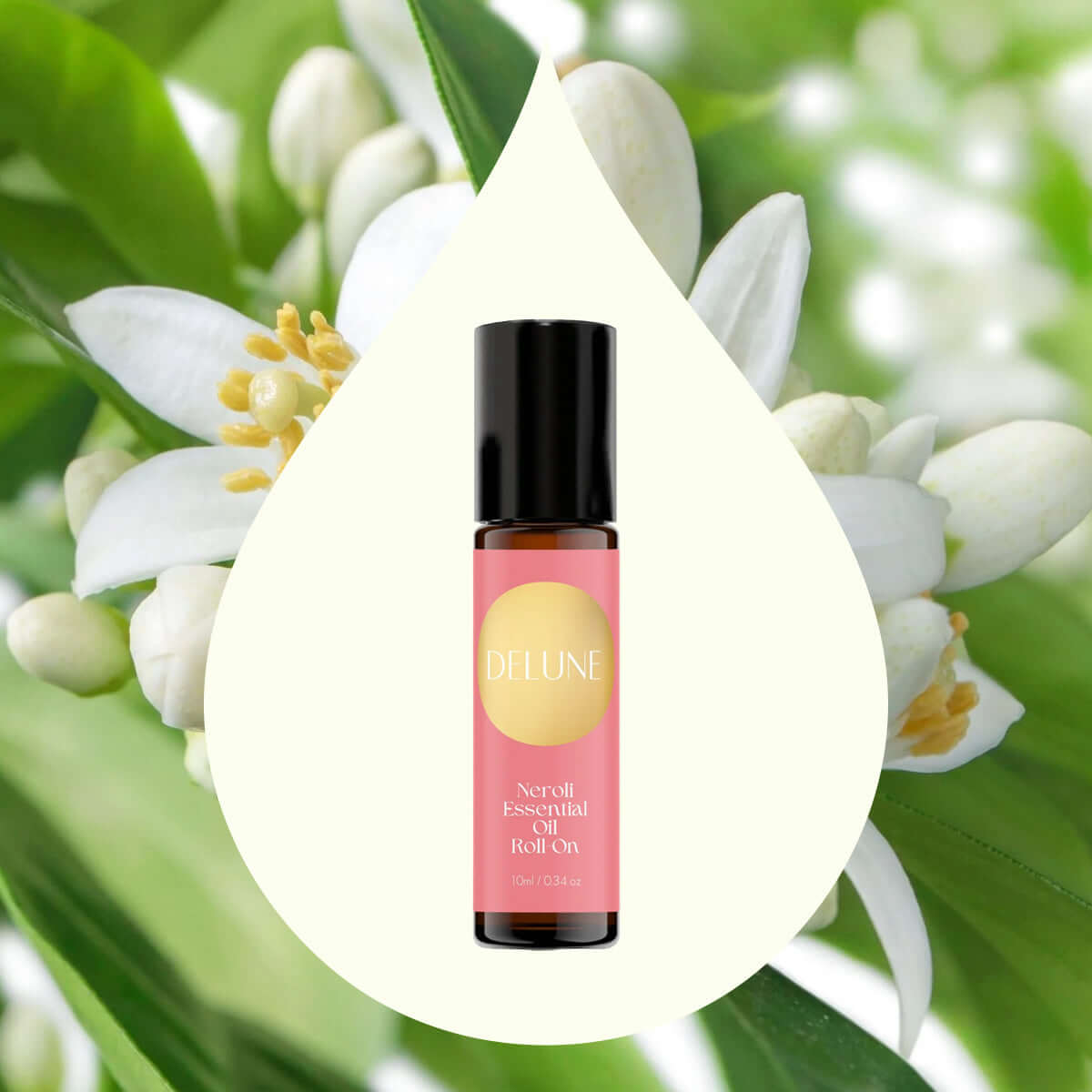 Neroli Essential Oil Roll-On with citrusy-floral scent, surrounded by orange blossoms, for stress relief and uplifting spirits.