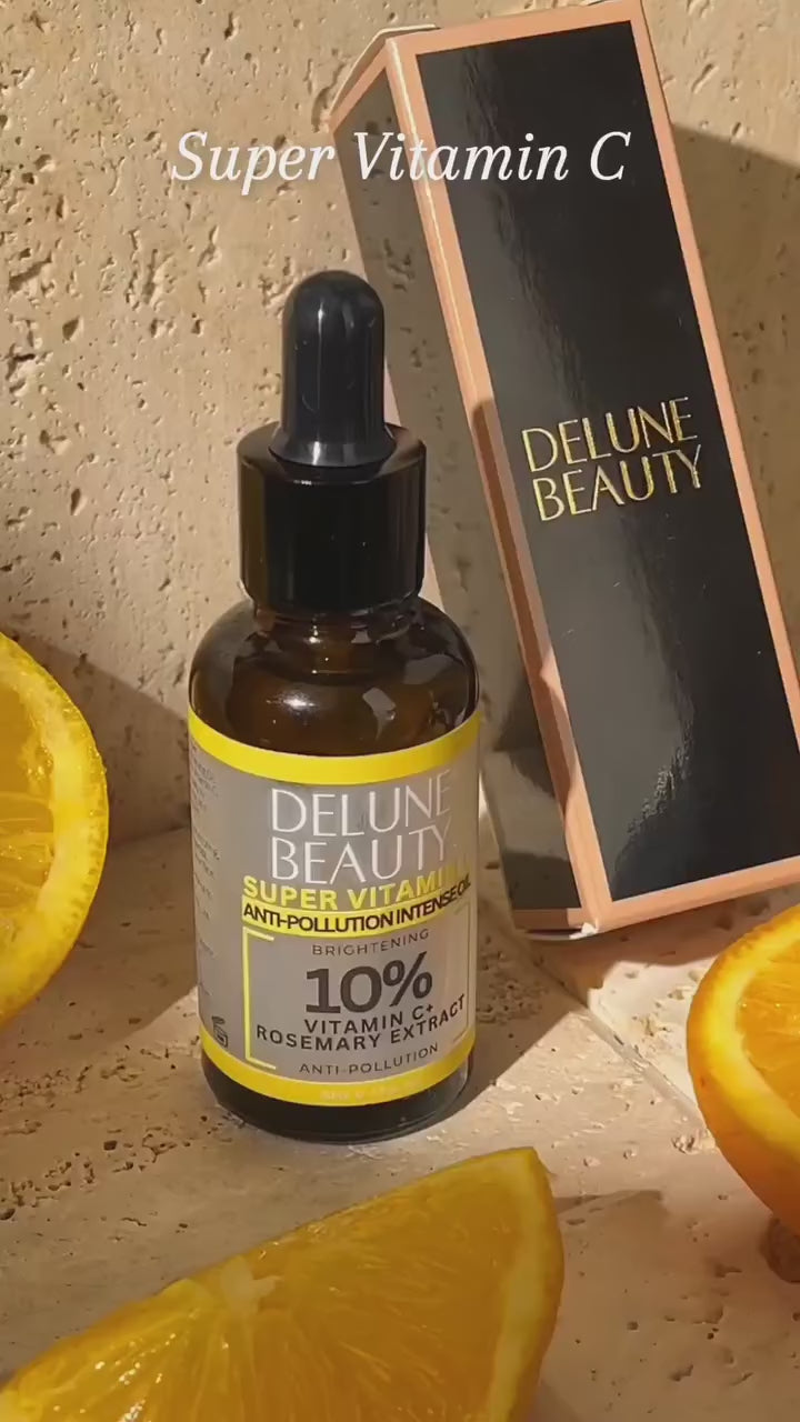 Delune's Super 10% Vitamin C Anti-Pollution Brightening Oil with packaging surrounded by fresh orange slices.