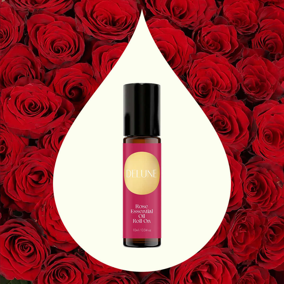 Rose Essential Oil Roll-On with floral scent for self-love and confidence, surrounded by red roses, in coconut oil base.