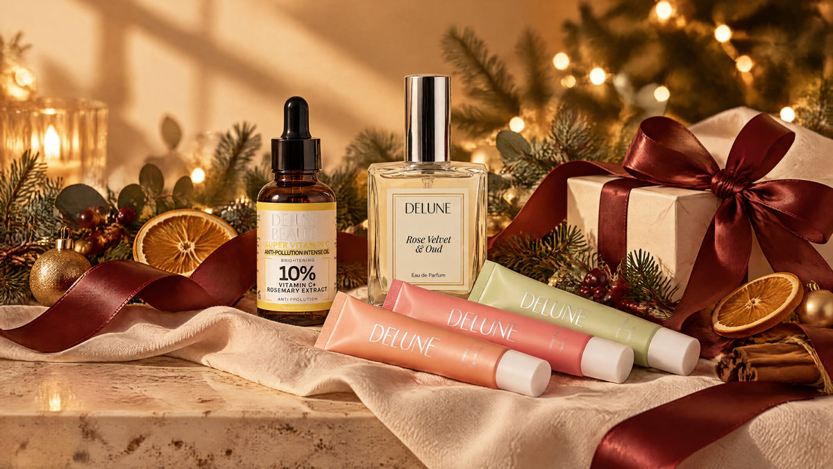 Delune Super Vitamin C, Rose Velvet & Oud and Lip Butter Balms styled for Christmas with a burgundy ribbon