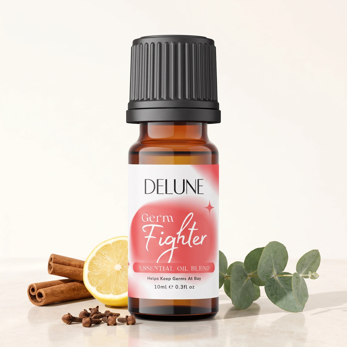 Essential oil blend UAE – Delune Dubai Germ Fighter Essential Oil Blend 10ml amber glass bottle with cinnamon sticks, lemon