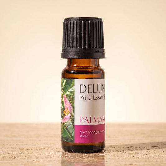 Palma Rosa essential oil UAE – Delune Dubai Palma Rosa Pure Essential Oil, 10ml amber glass bottle on warm travertine stone