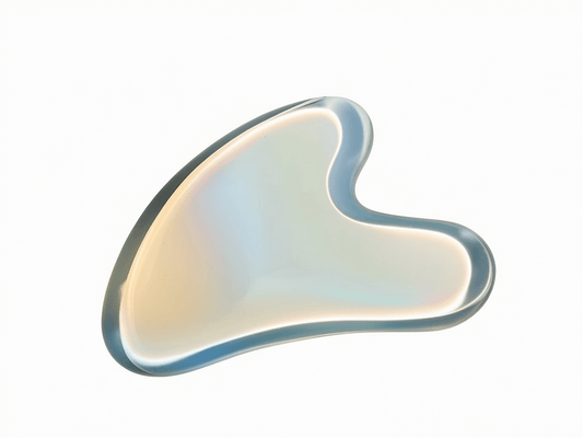 Opalite Gua Sha Tool for soothing skincare, promotes inner peace, emotional balance, and helps reduce tension and stress.